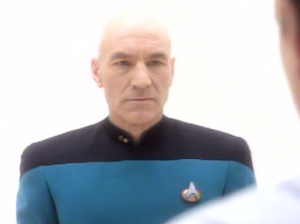 Picard in a blue uniform with low rank